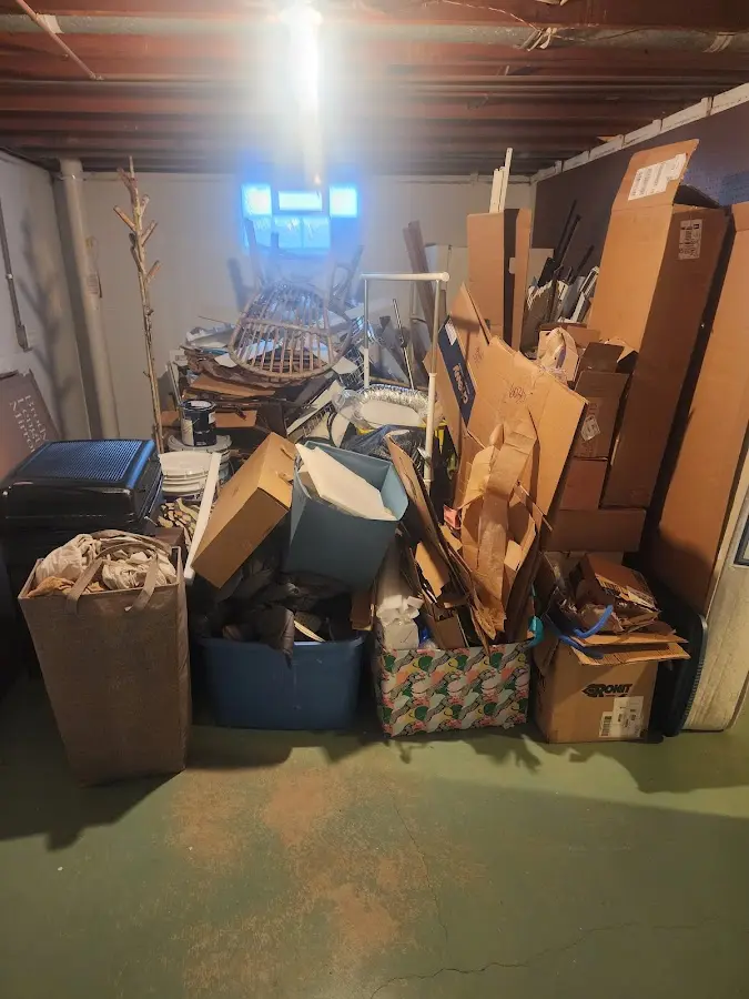 Roll-off dumpster container at job site for 4 Yard Dumpster Rental in Upper Salford